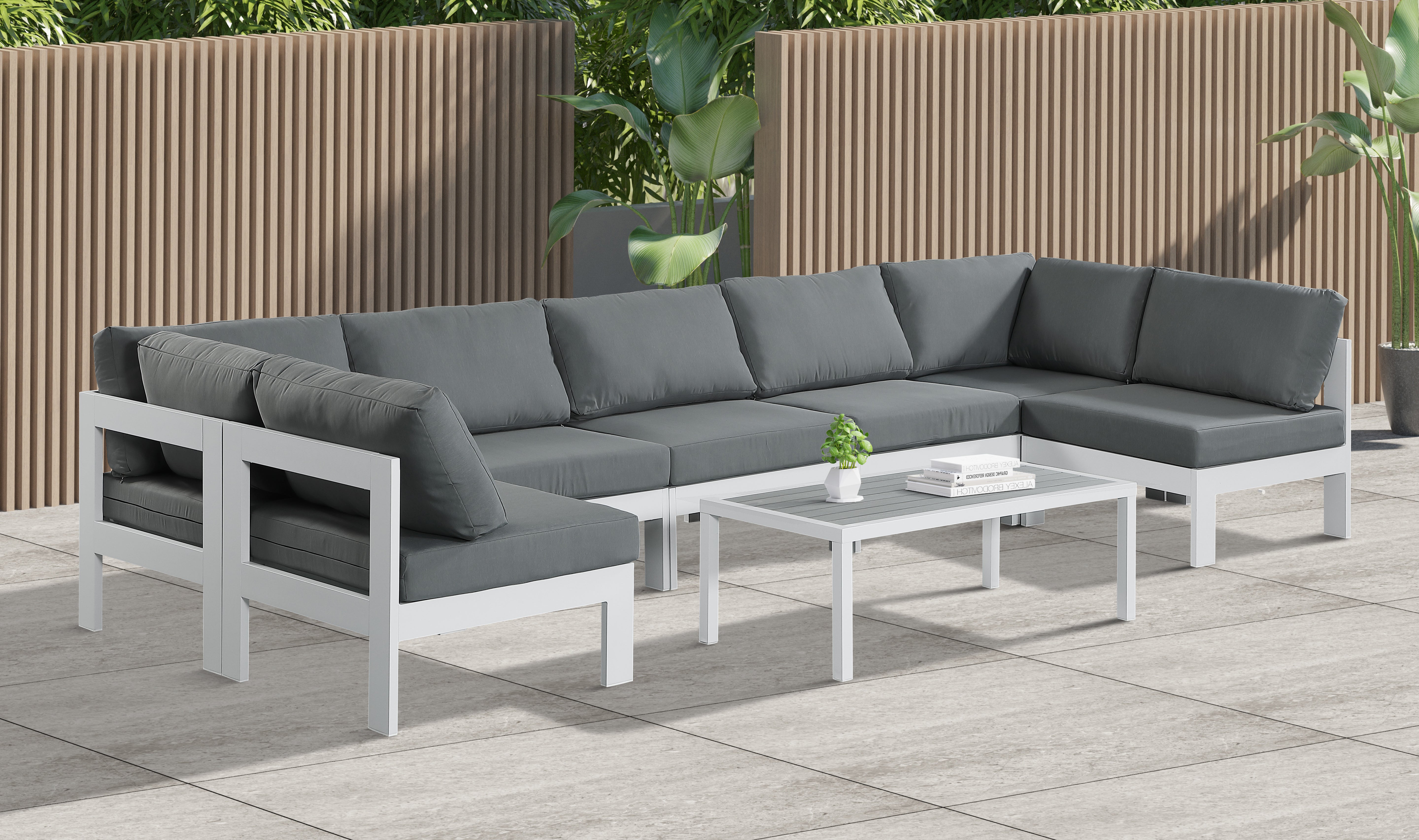 Nizuc 150" Water Resistant Fabric Upholstered Outdoor Patio 7pc. Modular Sectional