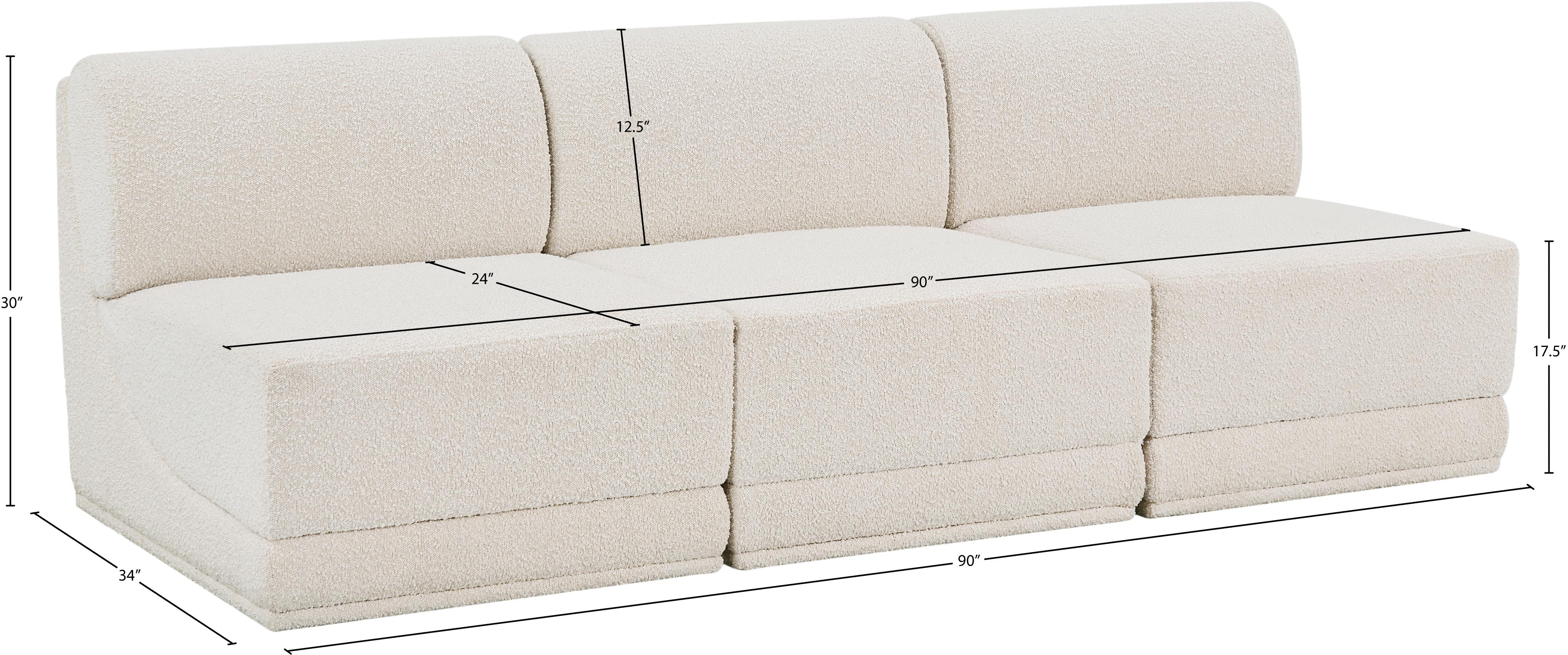 Canapé trois places sans accoudoirs en tissu Boucle Ollie