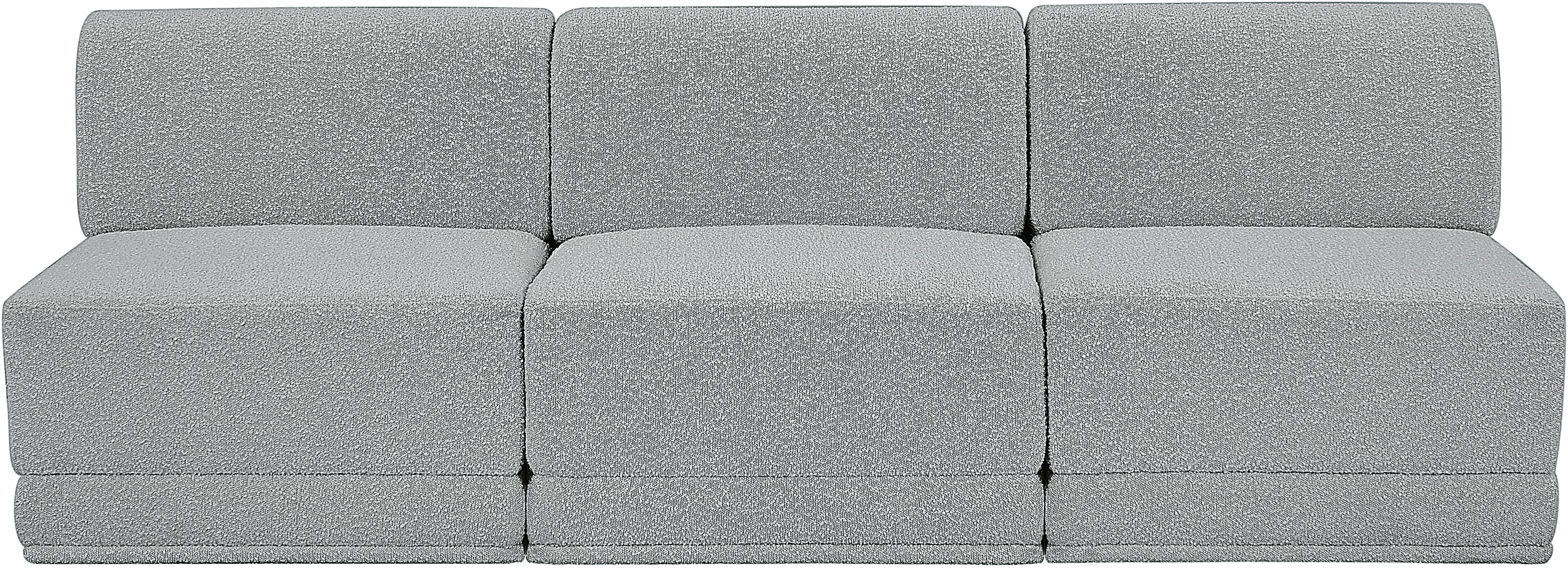 Canapé trois places sans accoudoirs en tissu Boucle Ollie