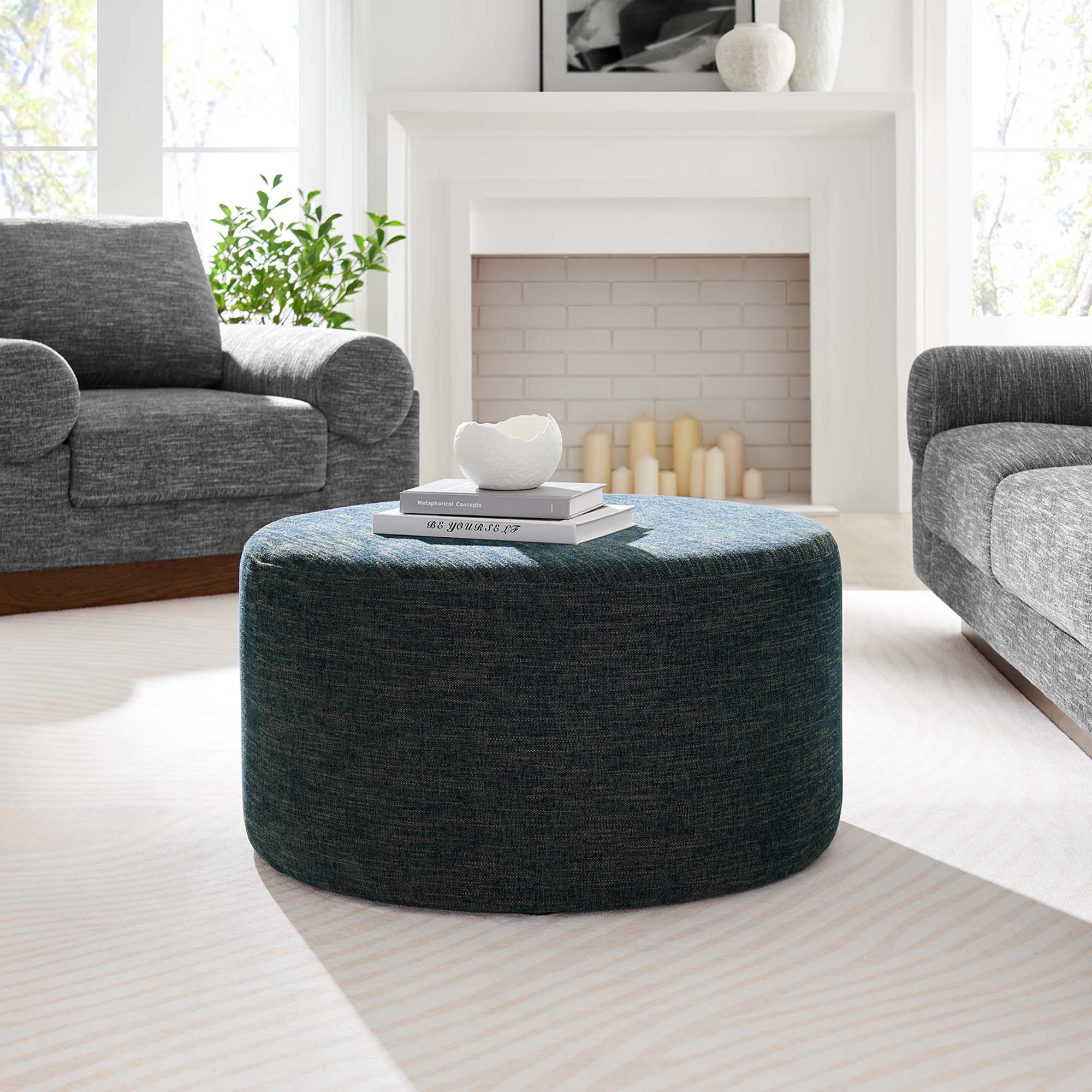 Callum Large Round Woven Heathered Fabric Upholstered Ottoman