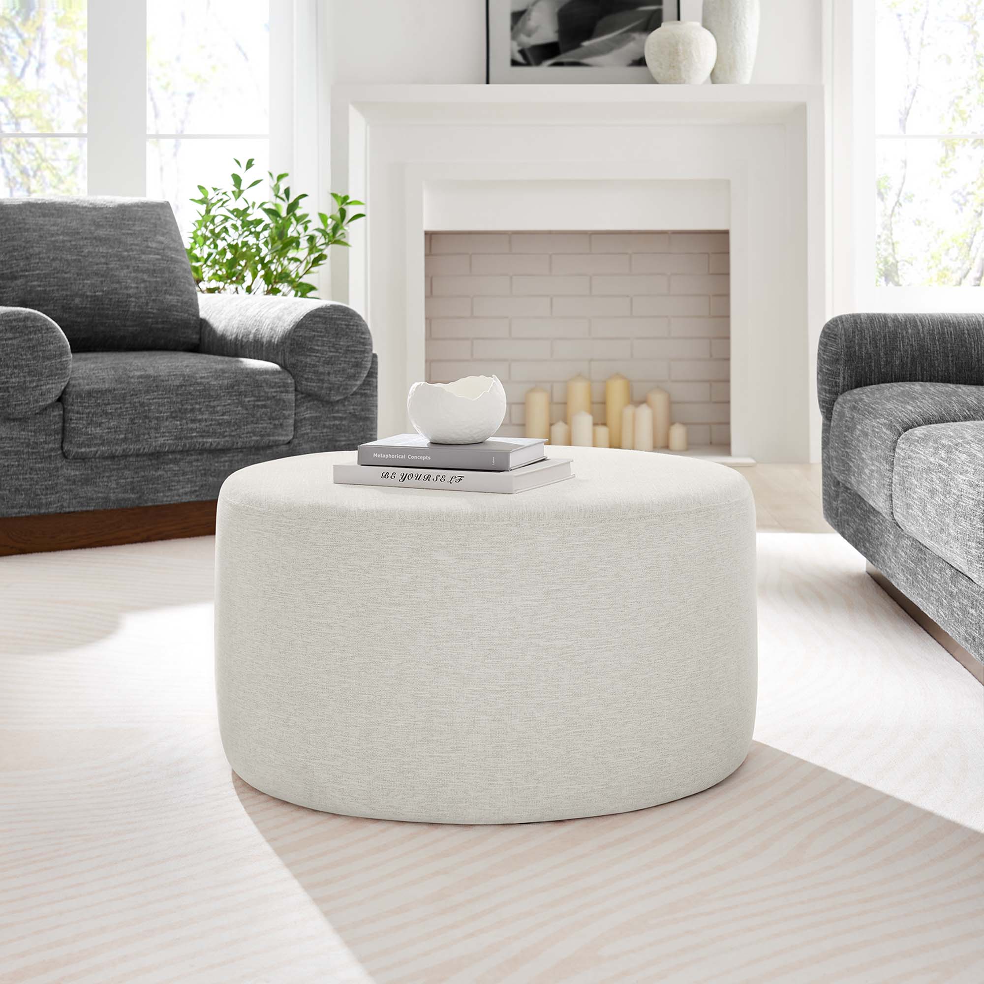 Callum Large Round Woven Heathered Fabric Upholstered Ottoman