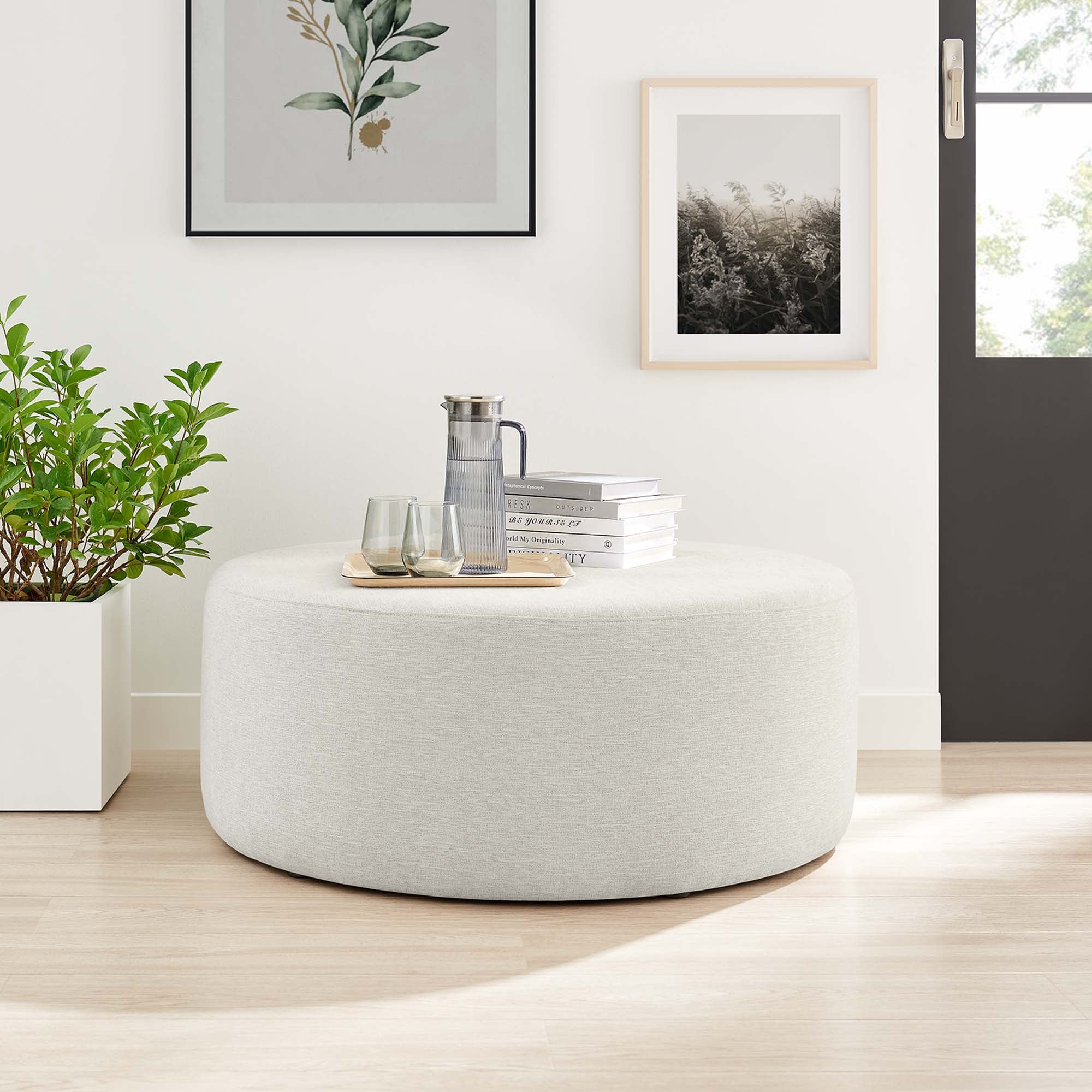 Callum Large Round Woven Heathered Fabric Upholstered Ottoman