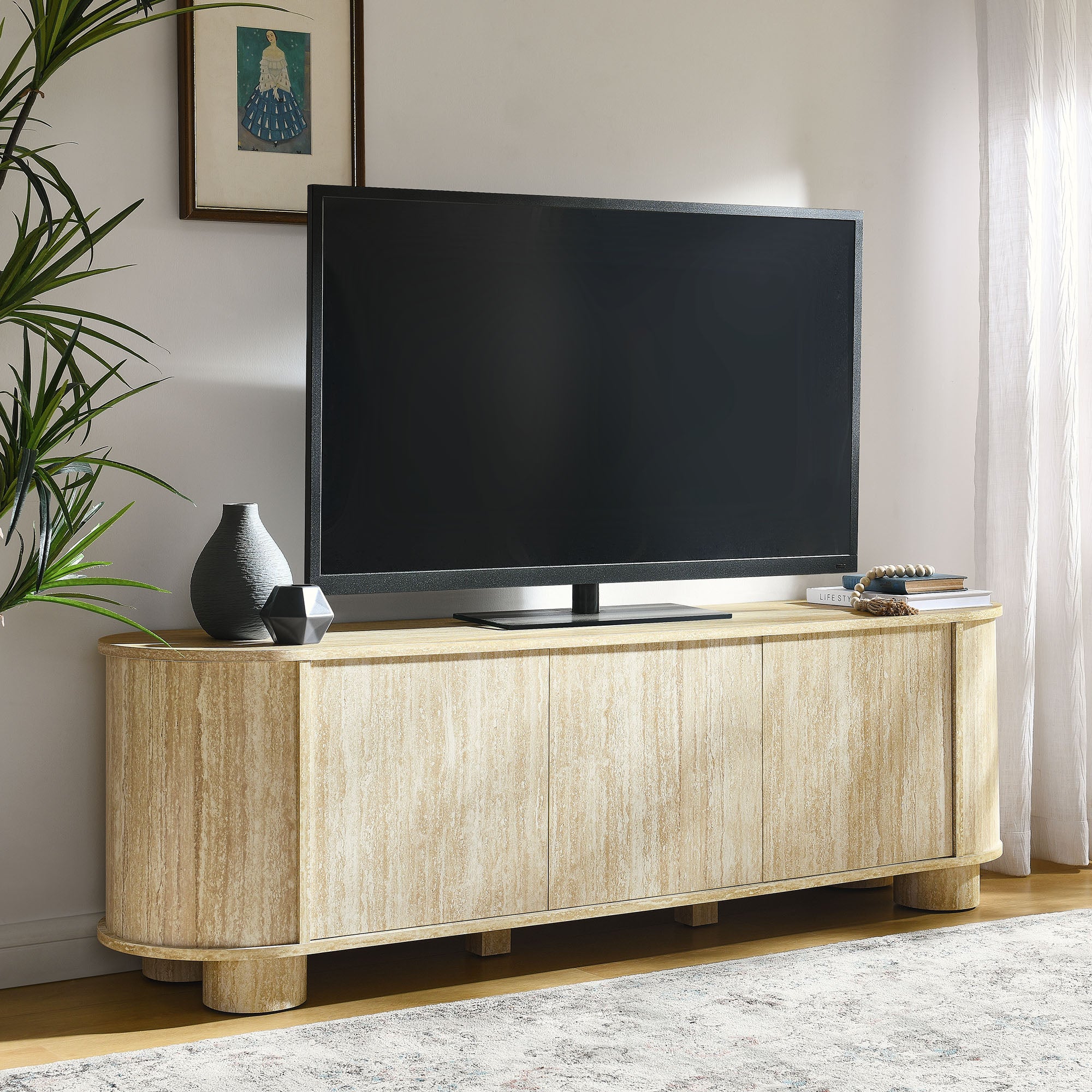 Overture 63” Oval Faux Travertine TV Stand in Travertine