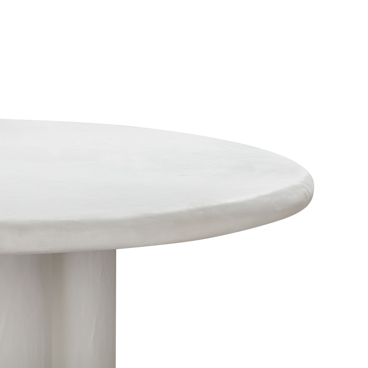 Table à manger ronde en faux plâtre blanc Elika