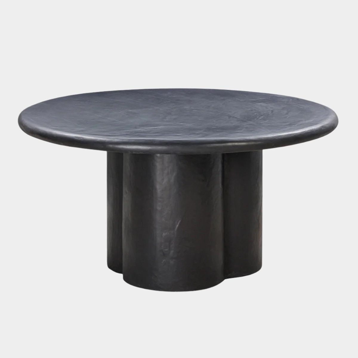 Table à manger ronde en faux plâtre noir Elika