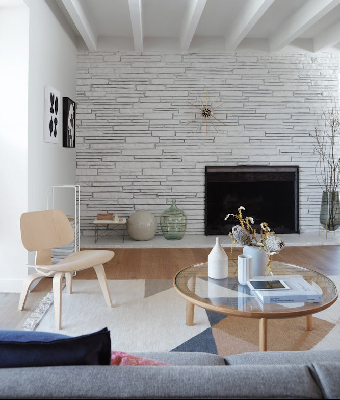 Chaise longue en contreplaqué moulé Eames avec base en bois
