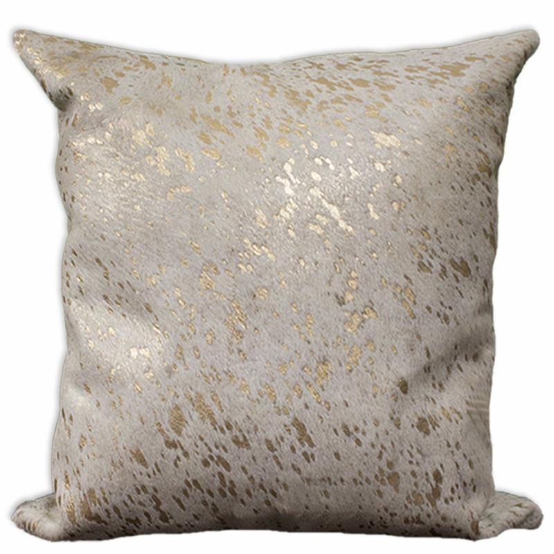 Coussin en peau de vache doré et blanc