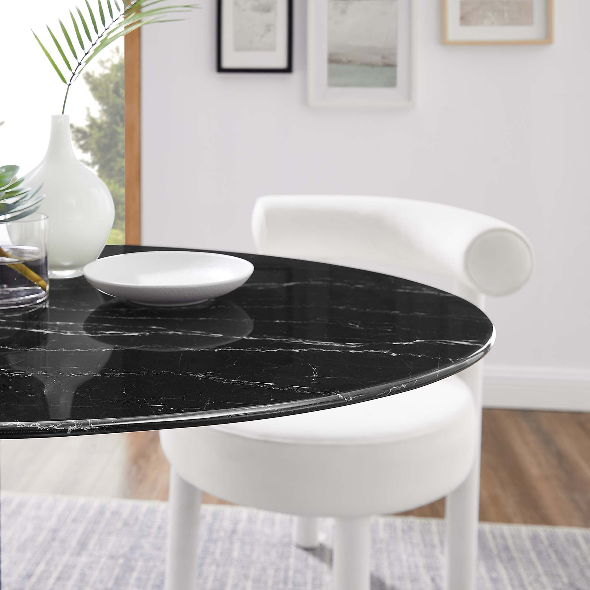 Lippa 42" Oval Artificial Marble Dining Table in Black Black