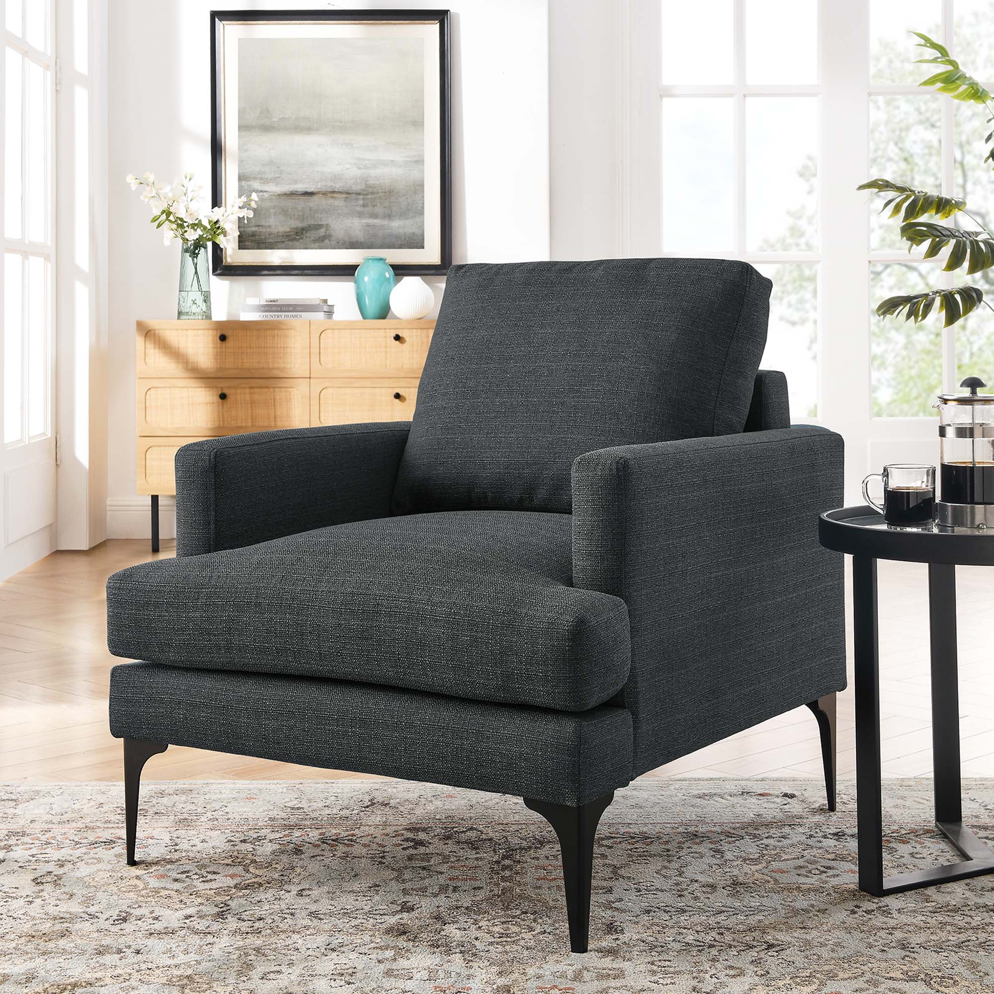 Fauteuil en tissu rembourré Evermore