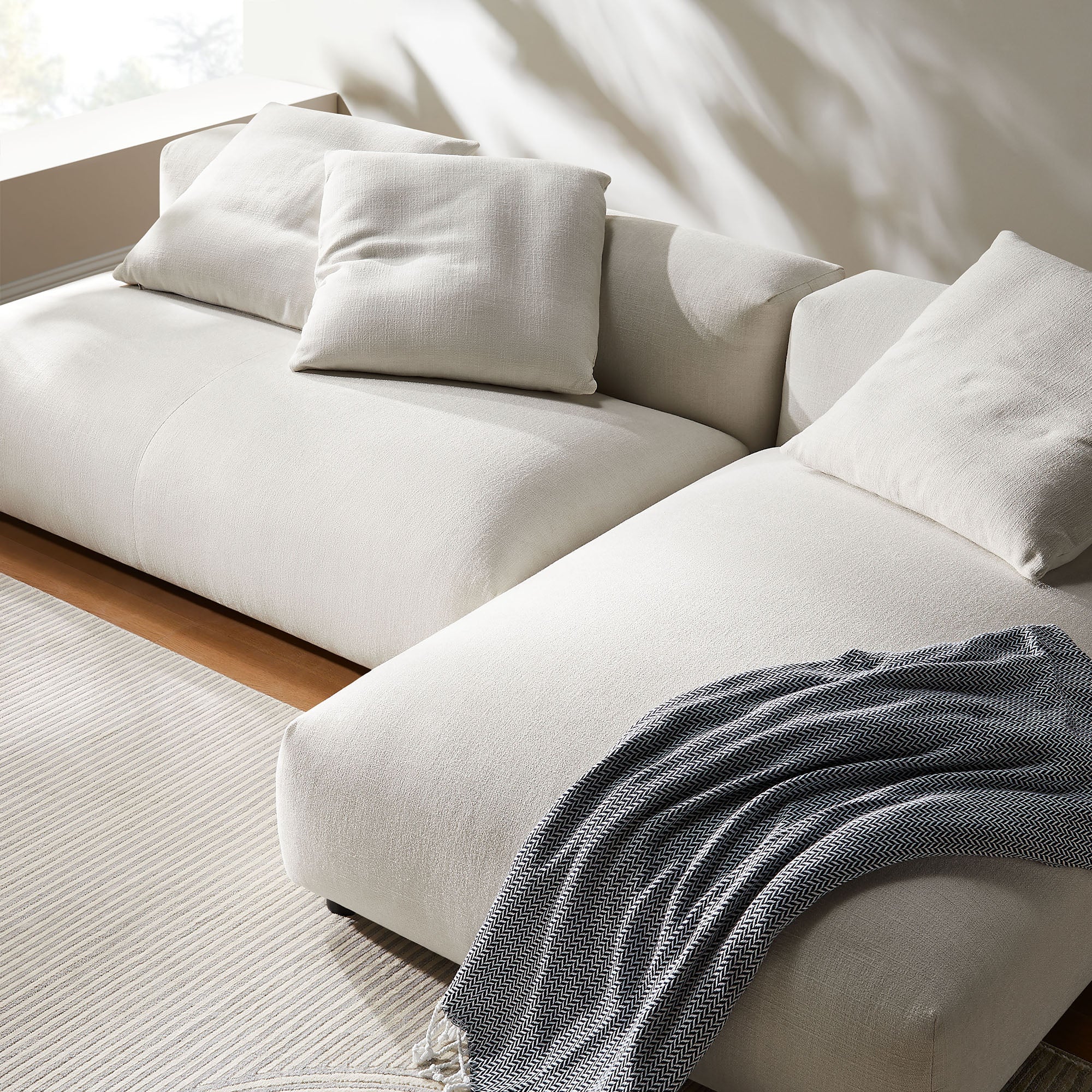 Chaise sans accoudoirs rembourrée en duvet Commix