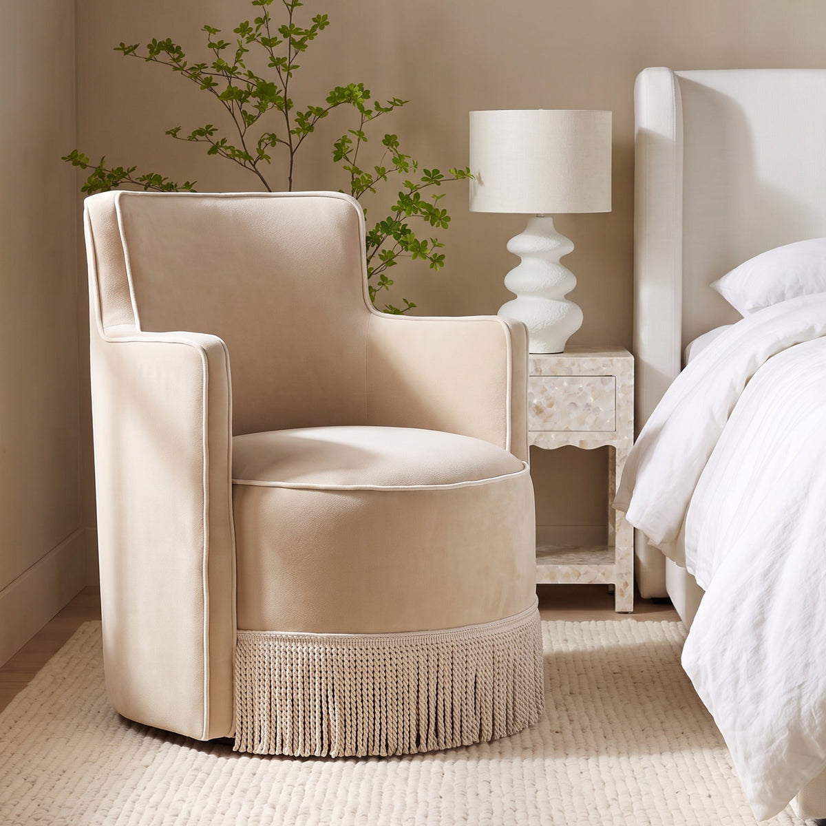 Passe Tasseled Velvet Swivel Accent Chair - Tan