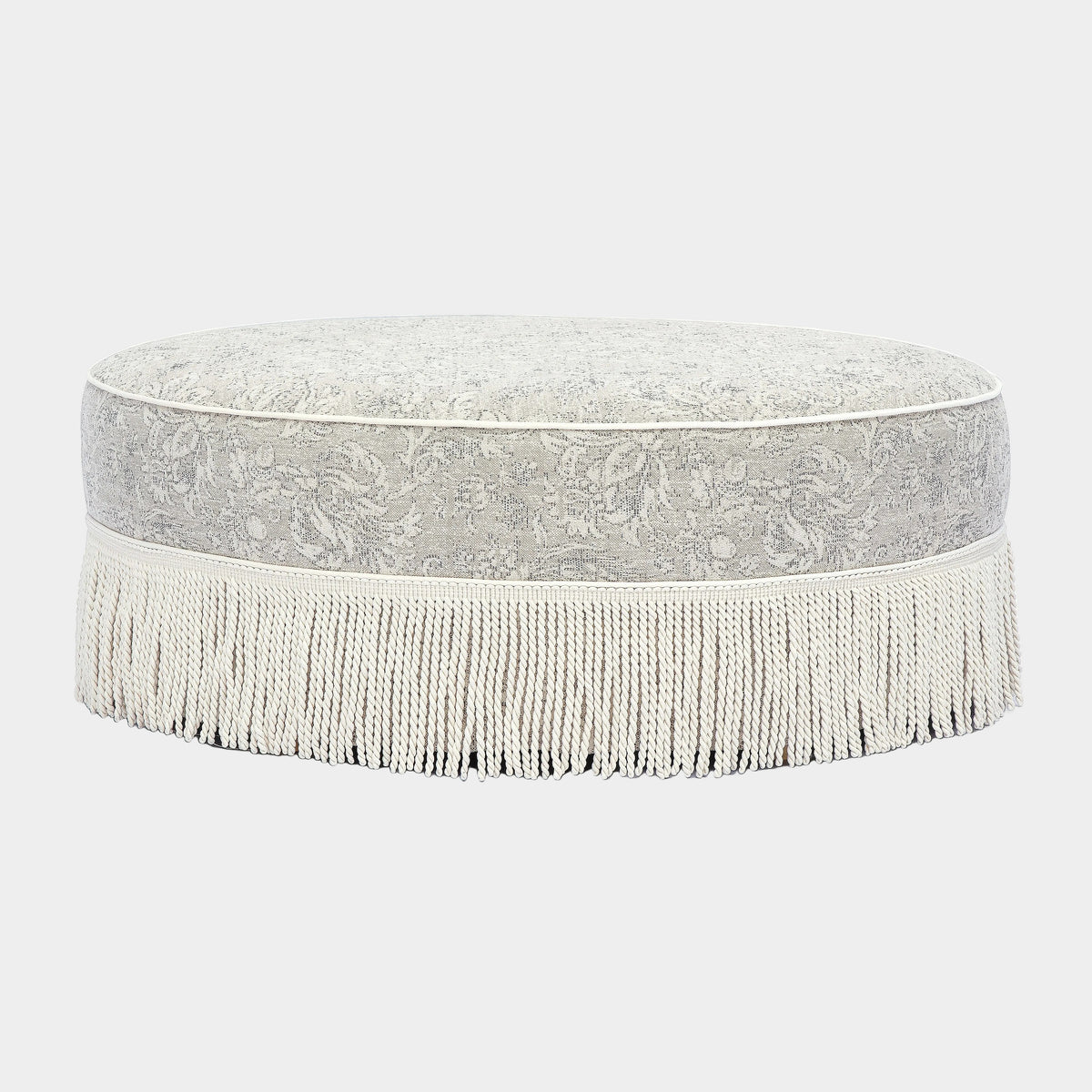 Tassy Tasseled Round Ottoman